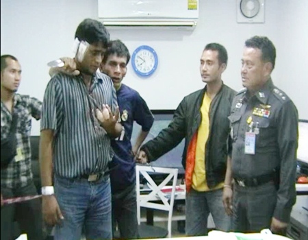 The Assailant demonstrates how he threatened the phone seller.